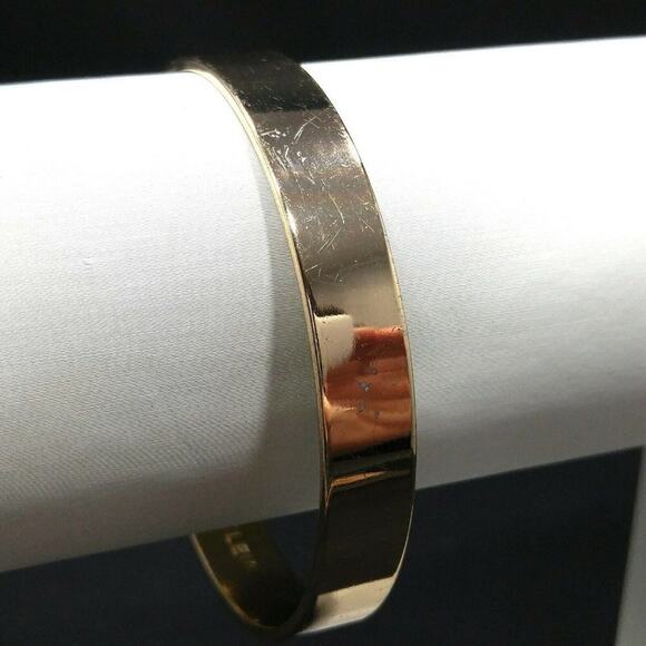 Anne Klein Solid Gold Tone Bangle Bracelet, 7 3/4 Inches, Very Reflective - Picture 5 of 8